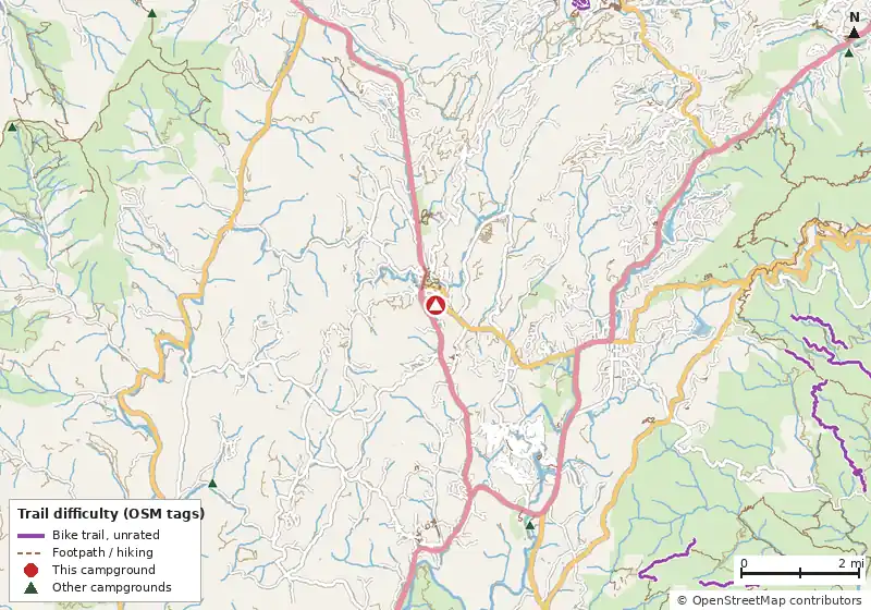Map of roads, water and trails within about 5 miles of Big Mike's Creekside RV Resort, with bike trails colored by their OpenStreetMap difficulty tags