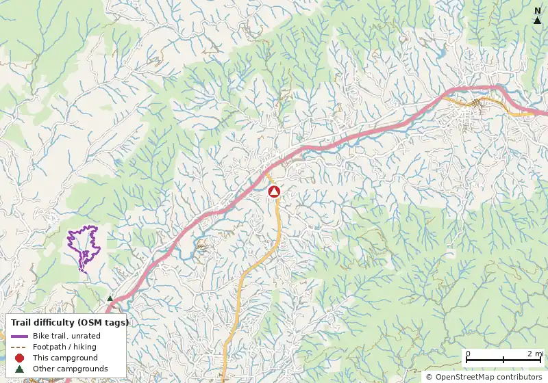 Map of roads, water and trails within about 5 miles of Bluebird Valley Campground, with bike trails colored by their OpenStreetMap difficulty tags