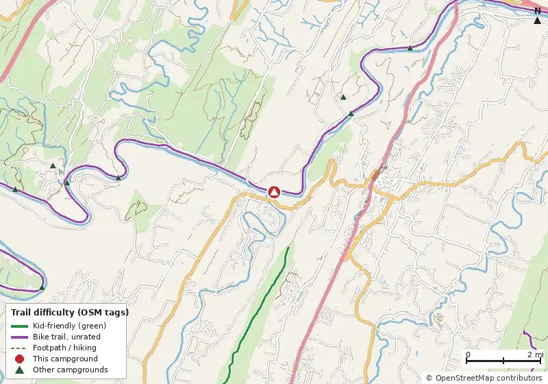 Map of roads, water and trails within about 5 miles of Cacapon Junction Hiker-Biker Overnight (HBO) Campsite, with bike trails colored by their OpenStreetMap difficulty tags