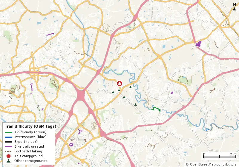 Map of roads, water and trails within about 5 miles of Camping World Racing Resort, with bike trails colored by their OpenStreetMap difficulty tags