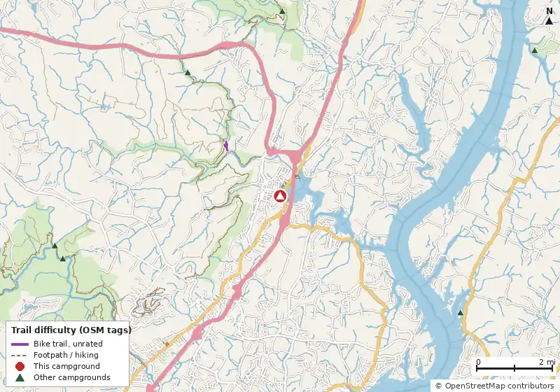 Map of roads, water and trails within about 5 miles of Colonial RV Park, with bike trails colored by their OpenStreetMap difficulty tags