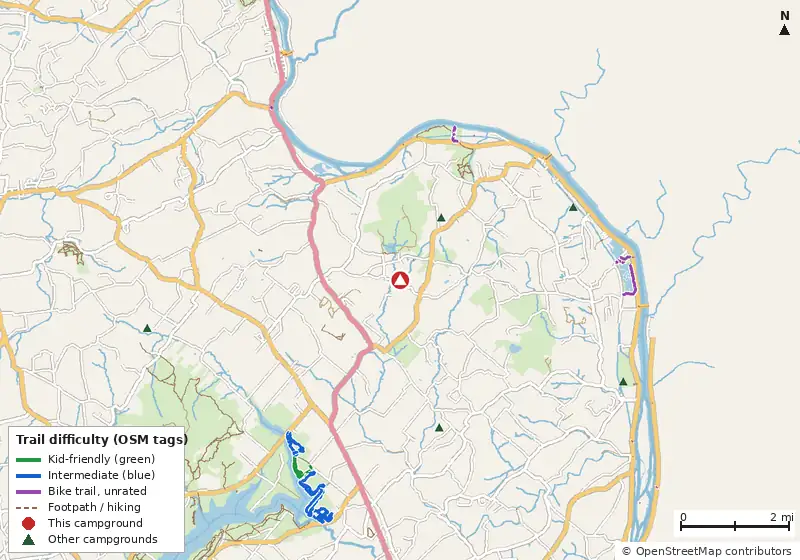 Map of roads, water and trails within about 5 miles of Colonial Woods Family Camping Resort, with bike trails colored by their OpenStreetMap difficulty tags