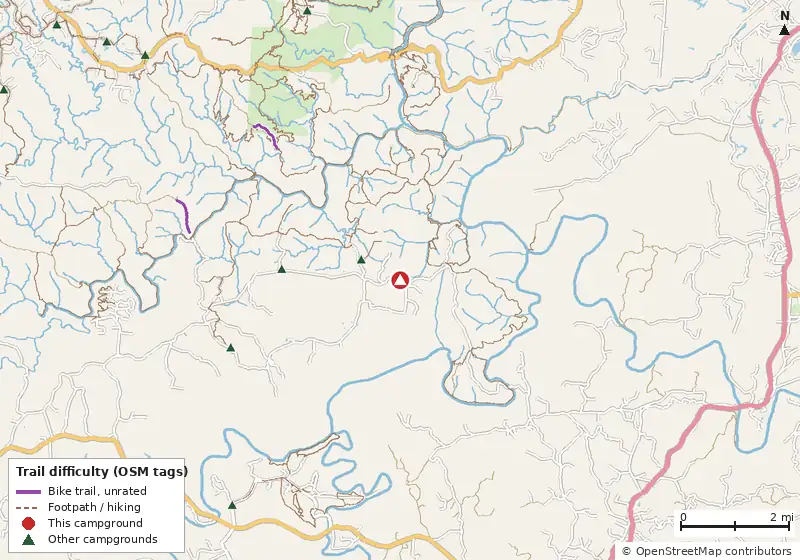 Map of roads, water and trails within about 5 miles of Cowboy Country Club Campground, with bike trails colored by their OpenStreetMap difficulty tags