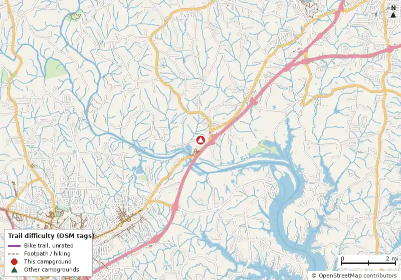 Map of roads, water and trails within about 5 miles of Cross Winds Family Campground, with bike trails colored by their OpenStreetMap difficulty tags