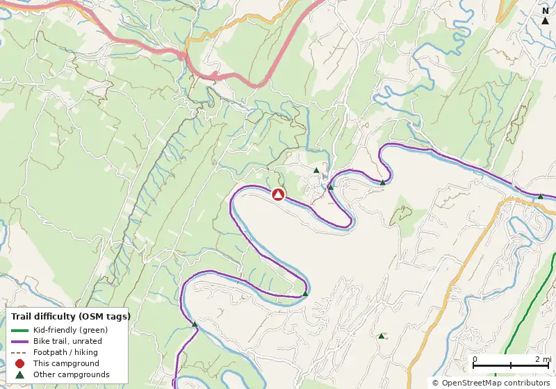 Map of roads, water and trails within about 5 miles of Devils Alley Hiker-Biker Campsite, with bike trails colored by their OpenStreetMap difficulty tags