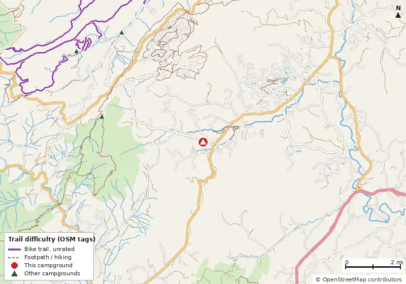 Map of roads, water and trails within about 5 miles of Devils Backbone Camp, with bike trails colored by their OpenStreetMap difficulty tags