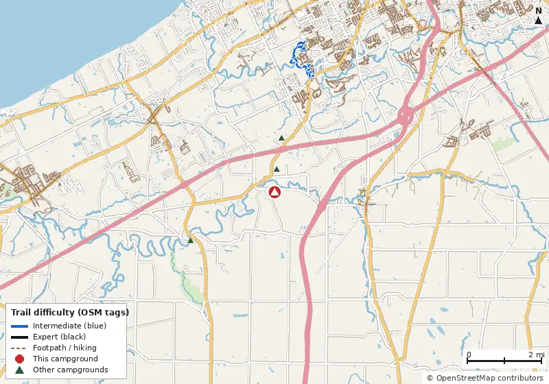 Map of roads, water and trails within about 5 miles of Erie KOA Holiday, with bike trails colored by their OpenStreetMap difficulty tags