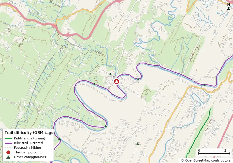 Map of roads, water and trails within about 5 miles of Fifteen Mile Creek Campsite, with bike trails colored by their OpenStreetMap difficulty tags
