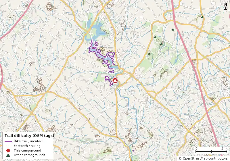 Map of roads, water and trails within about 5 miles of Green Lane Park Deep Creek Campground, with bike trails colored by their OpenStreetMap difficulty tags