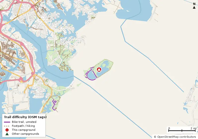 Map of roads, water and trails within about 5 miles of Hart-Miller Island State Park Campground, with bike trails colored by their OpenStreetMap difficulty tags