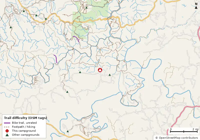 Map of roads, water and trails within about 5 miles of HoneyCreek Horse Camp, with bike trails colored by their OpenStreetMap difficulty tags