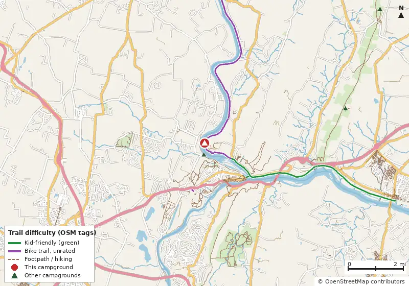 Map of roads, water and trails within about 5 miles of Huckleberry Hill Hiker-Biker Campsite, with bike trails colored by their OpenStreetMap difficulty tags