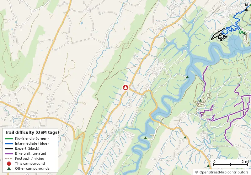 Map of roads, water and trails within about 5 miles of James Creek RV Resort By RJourney, with bike trails colored by their OpenStreetMap difficulty tags
