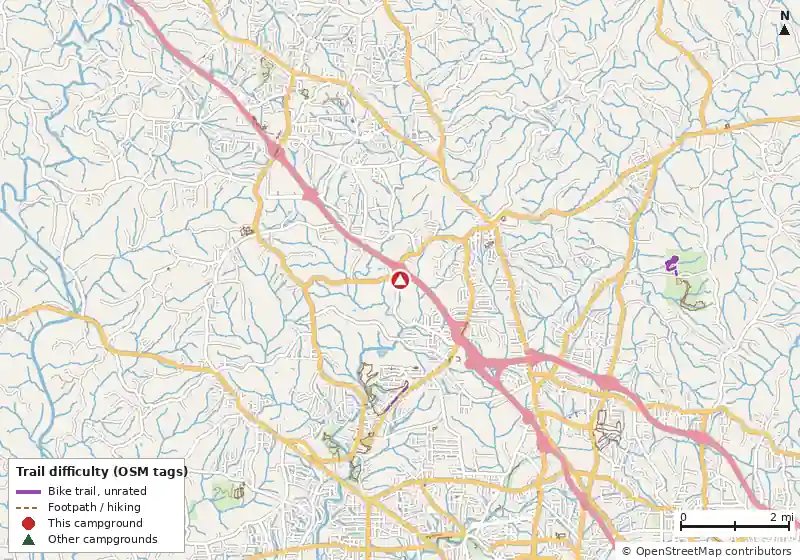 Map of roads, water and trails within about 5 miles of Love's RV Hookup, with bike trails colored by their OpenStreetMap difficulty tags