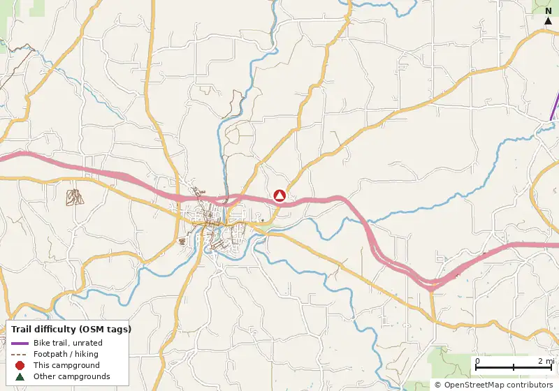 Map of roads, water and trails within about 5 miles of Love's RV Hookup, with bike trails colored by their OpenStreetMap difficulty tags