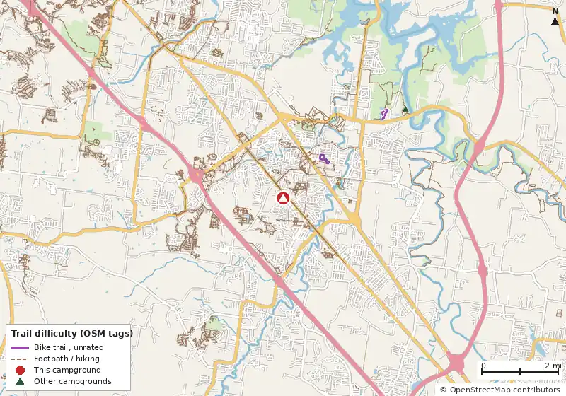 Map of roads, water and trails within about 5 miles of Nashville I-24 Campground, with bike trails colored by their OpenStreetMap difficulty tags