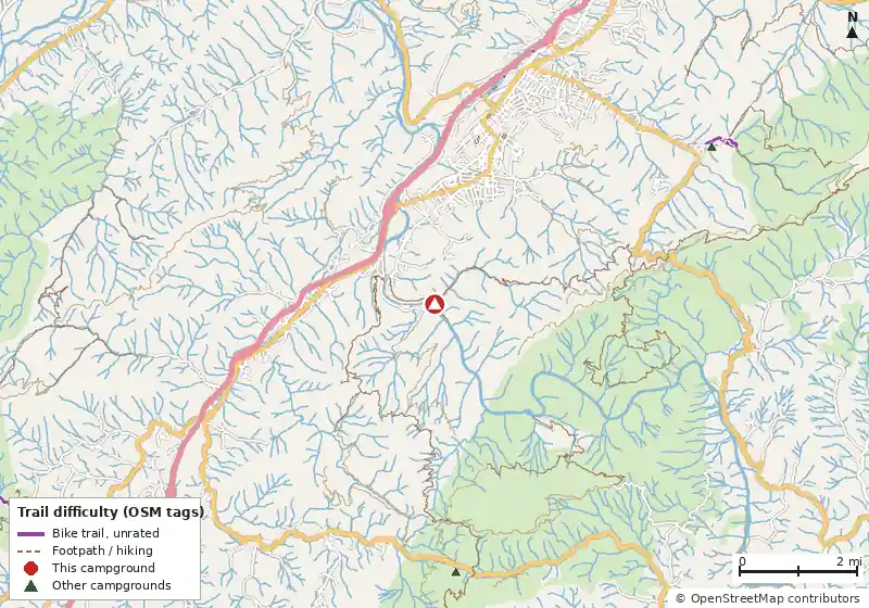 Map of roads, water and trails within about 5 miles of Nolichucky Gorge Campground and Cabins, with bike trails colored by their OpenStreetMap difficulty tags