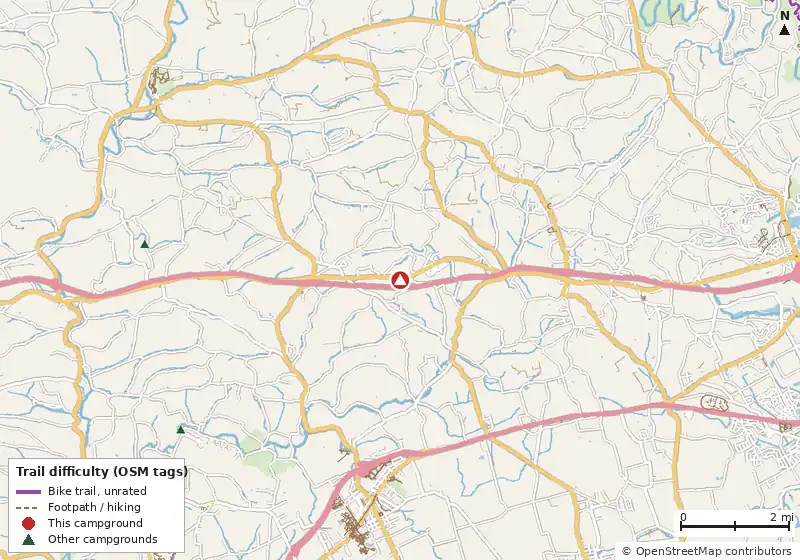 Map of roads, water and trails within about 5 miles of Pine Hill RV Park, with bike trails colored by their OpenStreetMap difficulty tags