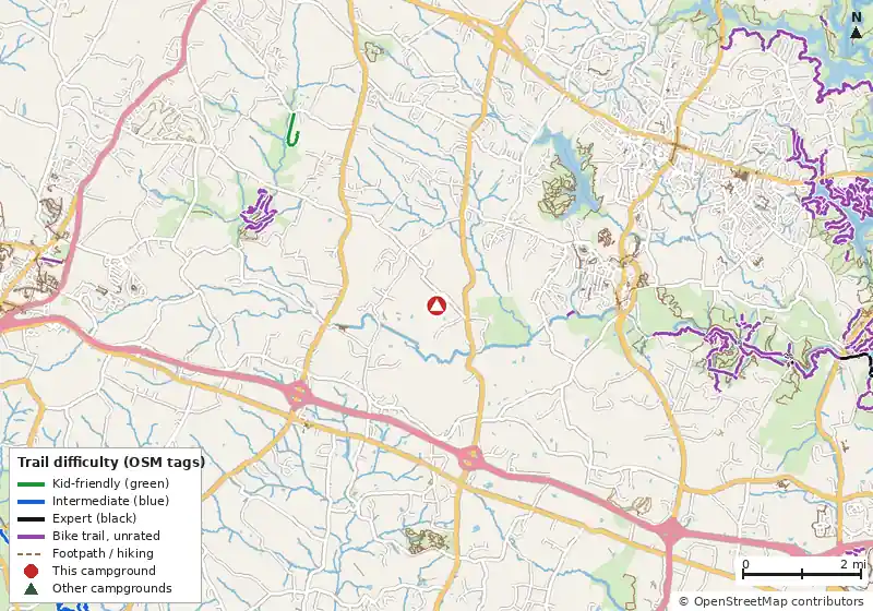 Map of roads, water and trails within about 5 miles of Ramblin’ Pines Campground, with bike trails colored by their OpenStreetMap difficulty tags