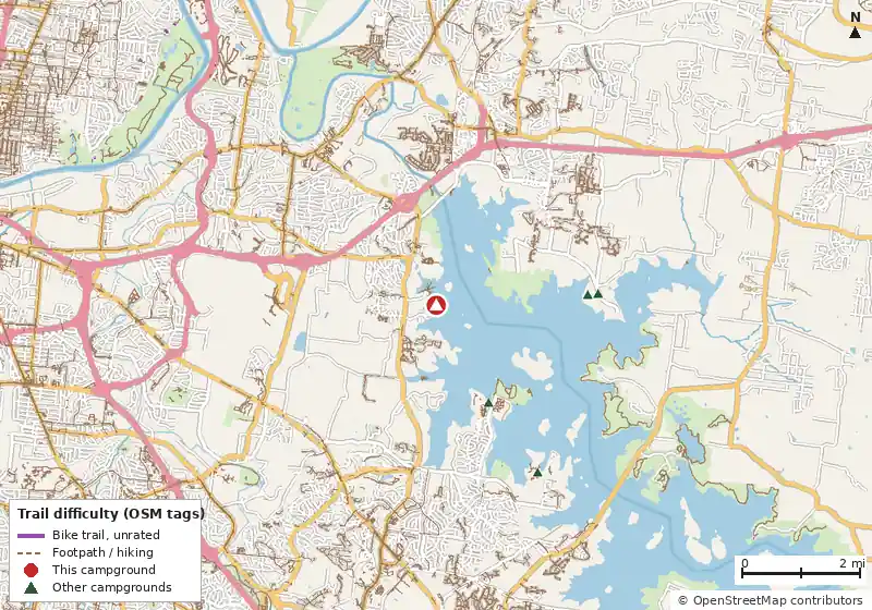 Map of roads, water and trails within about 5 miles of Safe Harbor RV Resort, with bike trails colored by their OpenStreetMap difficulty tags