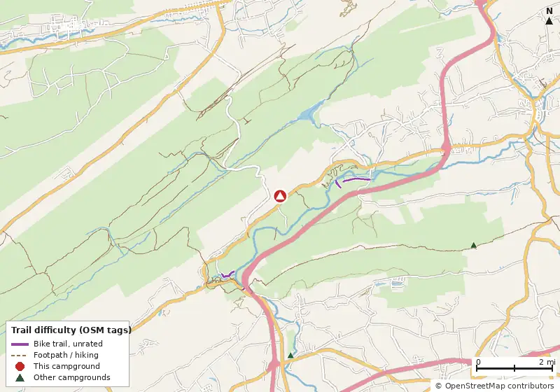 Map of roads, water and trails within about 5 miles of Twin Grove RV Resort & Cottages, with bike trails colored by their OpenStreetMap difficulty tags