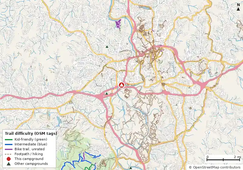 Map of roads, water and trails within about 5 miles of Wilson's Riverfront RV Park, with bike trails colored by their OpenStreetMap difficulty tags