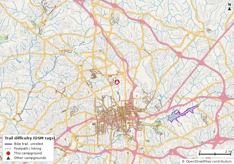 Map of roads, water and trails within about 5 miles of Winston-Salem Fairgrounds RV Campground, with bike trails colored by their OpenStreetMap difficulty tags